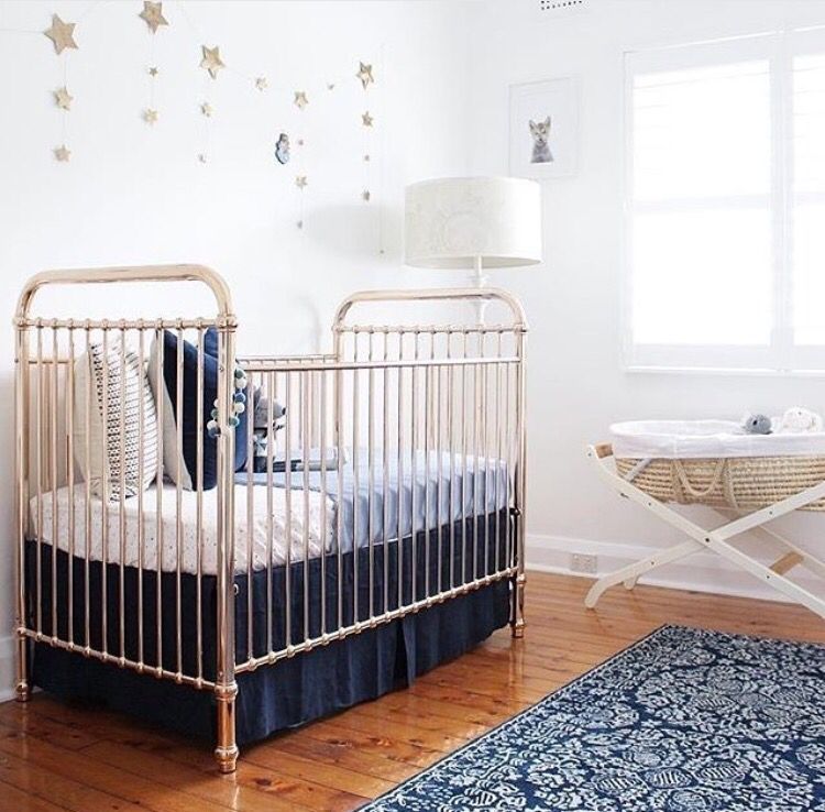 blue and cream nursery cot