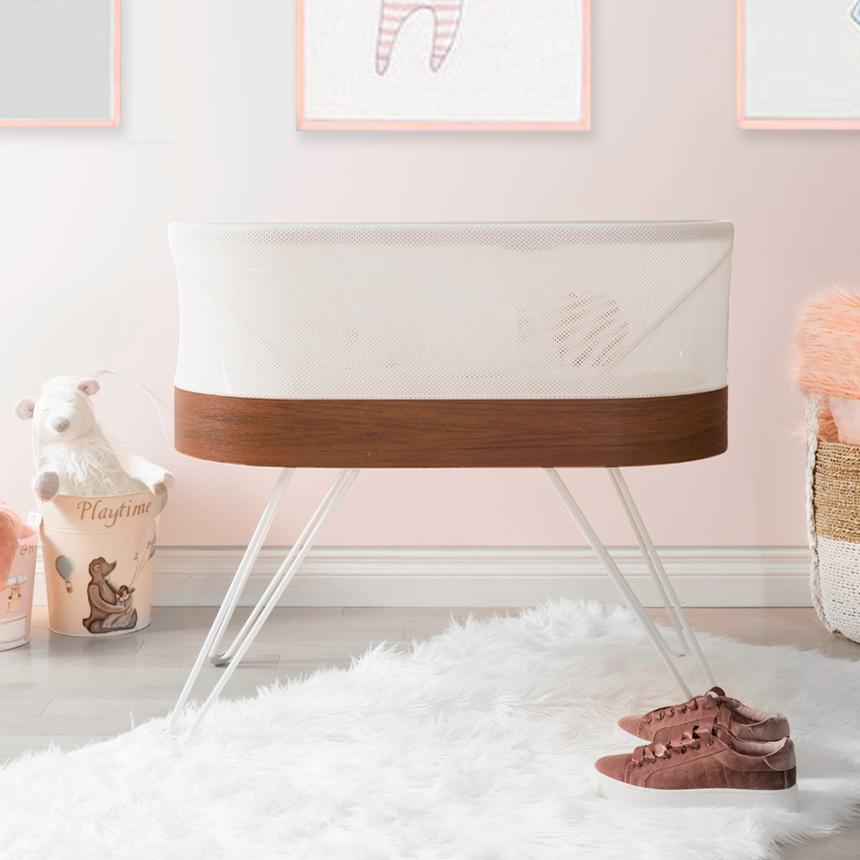 portable white cot with brown edging