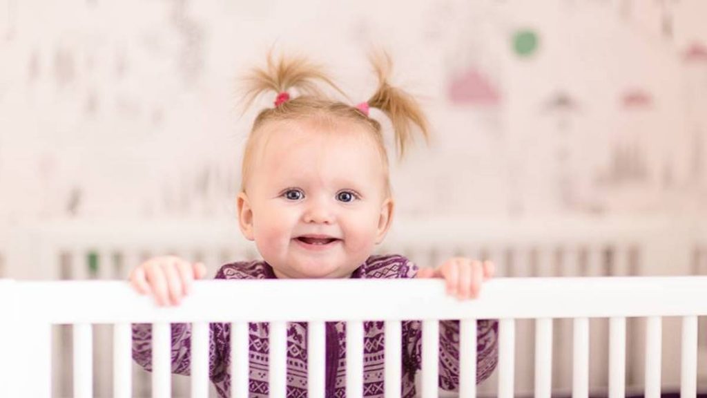 baby toddler in cot