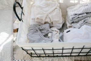 basket of clean baby clothes