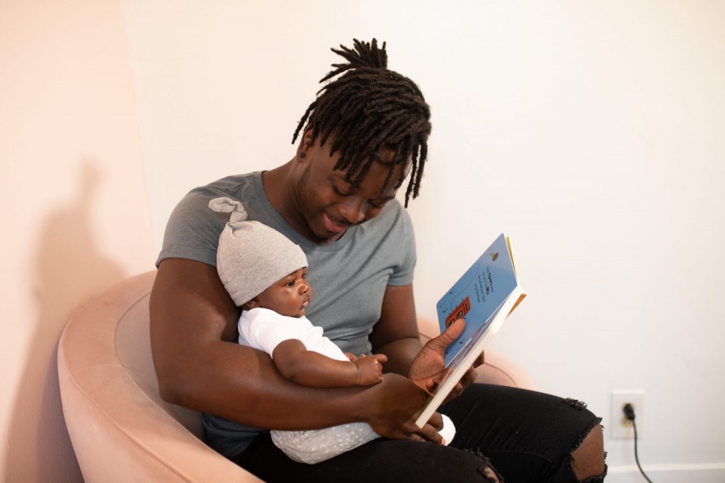 showing book to baby