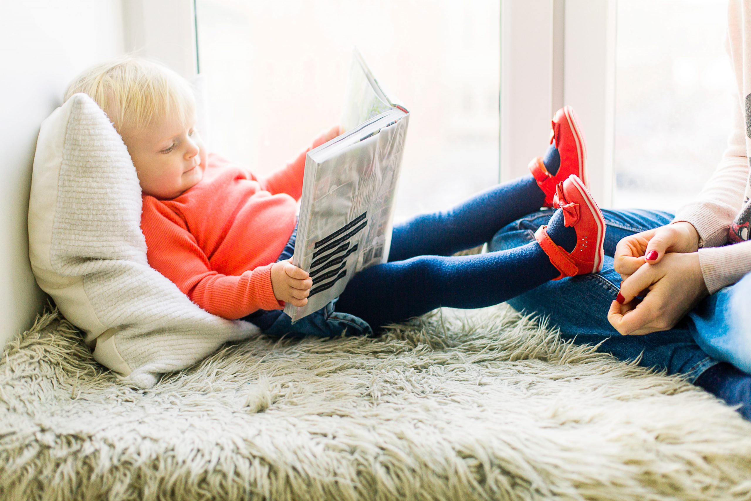 baby looking at a book