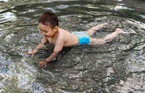 baby in sea water