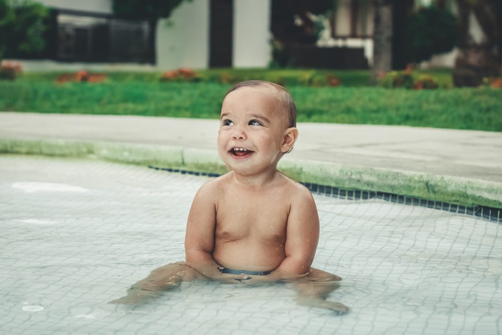 baby swimming with diaper