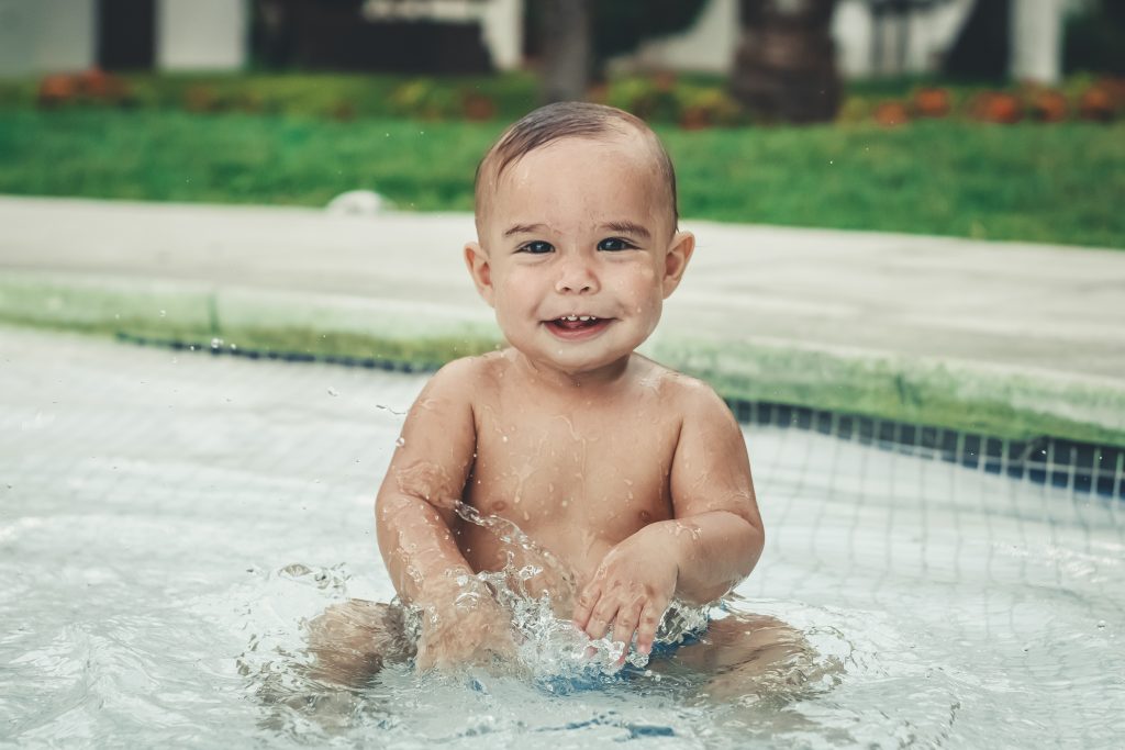 baby swimming with diaper