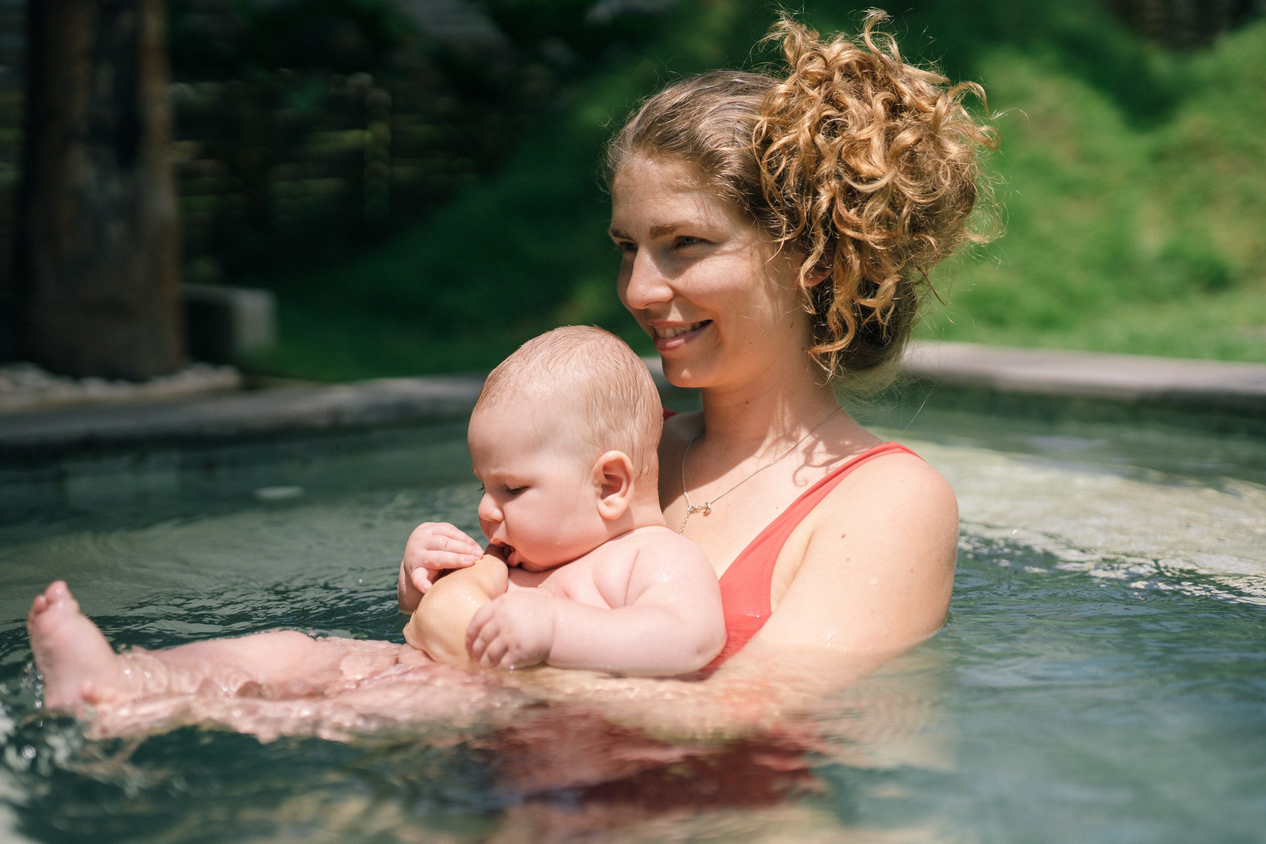 baby swimming in the poo;