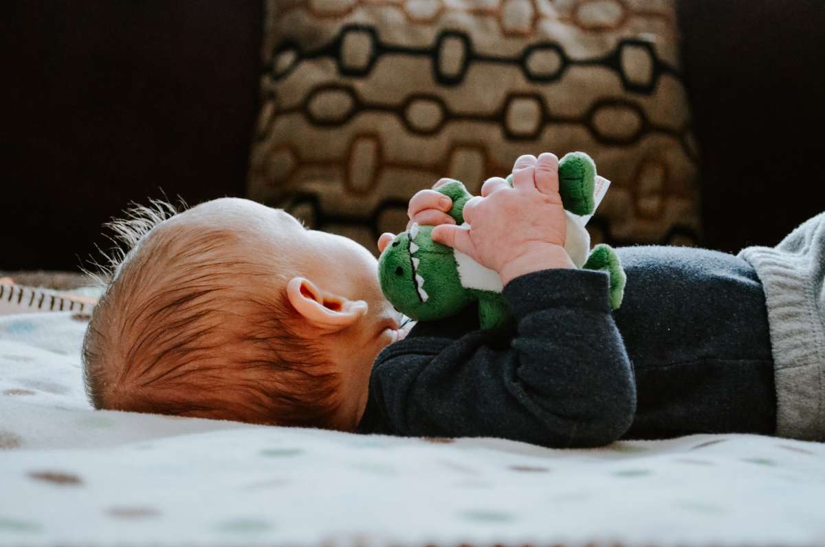 why is it a bad idea to leave a stuffed toy in a crib with a baby