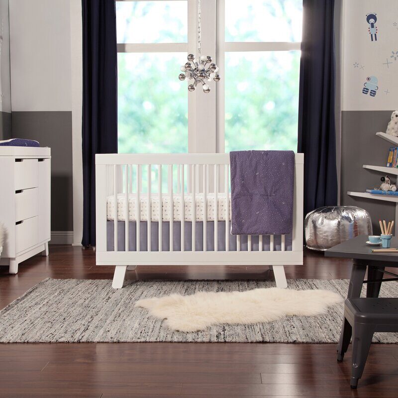 white baby cot in nursery